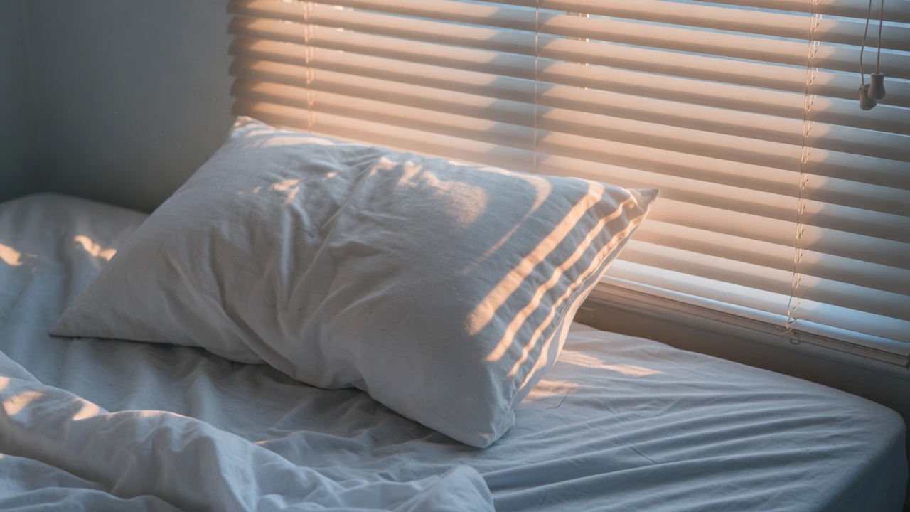 Soft morning light on bedding