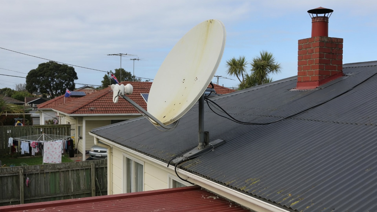 Satellite dish on a suburban roof