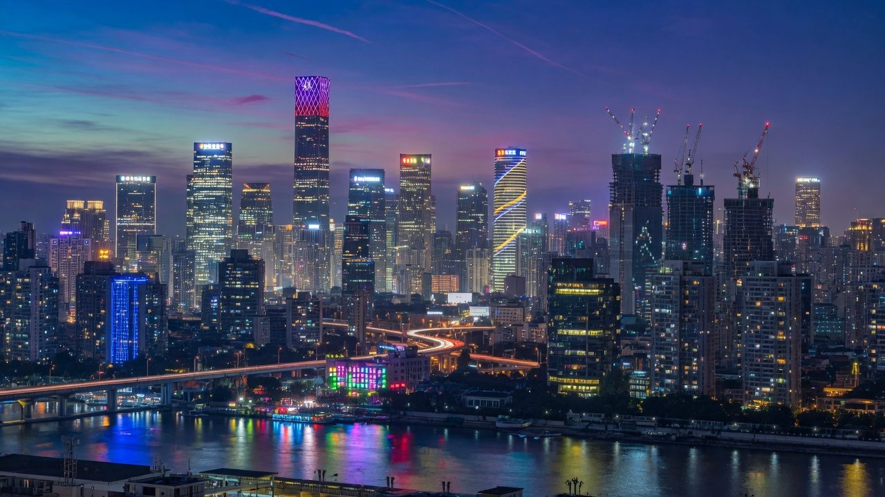 Dense modern Asian city skyline at soft dusk